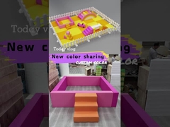 بازی نرم نارنجی با توپ و گل رز قرمز نرم در داخل خانه